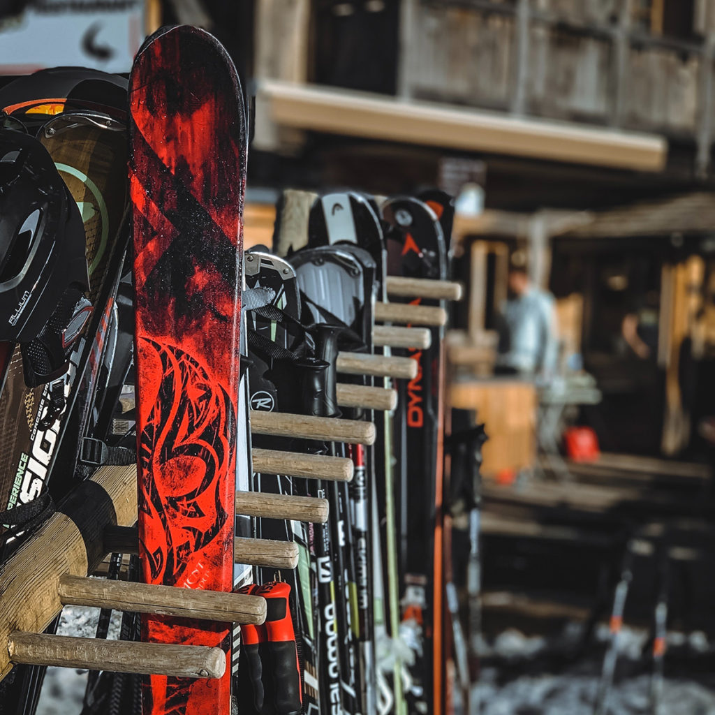 skis-on-rack-outside-lodge