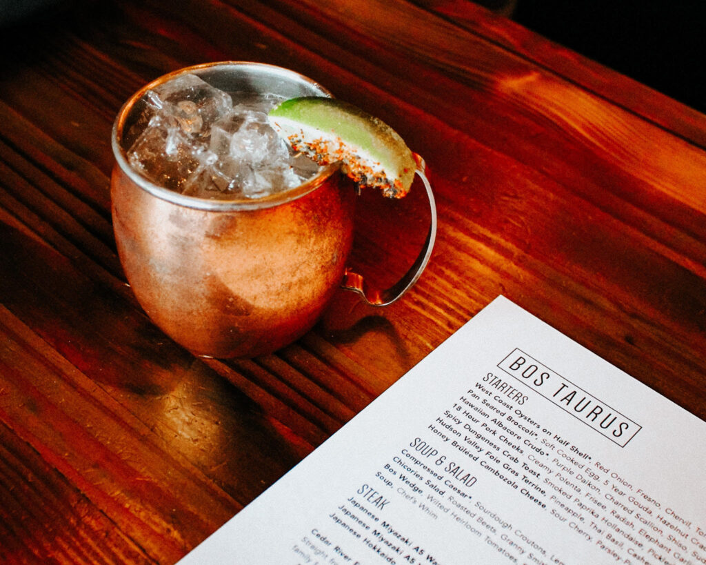 A Moscow mule and menu at Bos Taurus restaurant in Bend, OR.