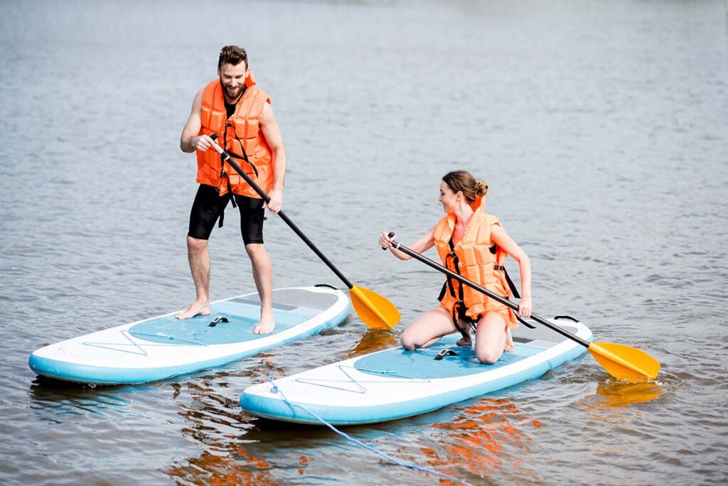 Couple paddle boarding on the Deschutes.